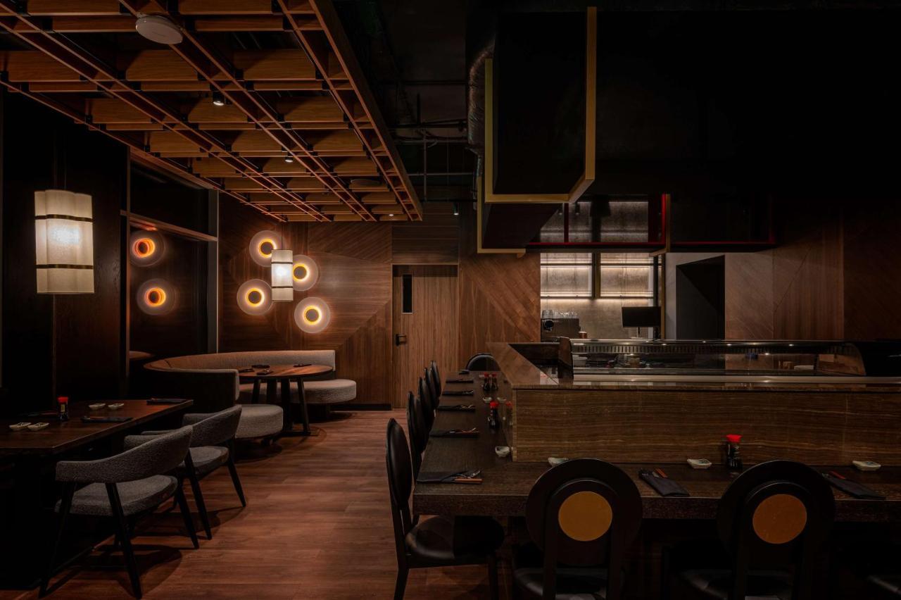 Radisson Blu Hotel, Cluj ภายนอก รูปภาพ Interior of a restaurant in Tokyo