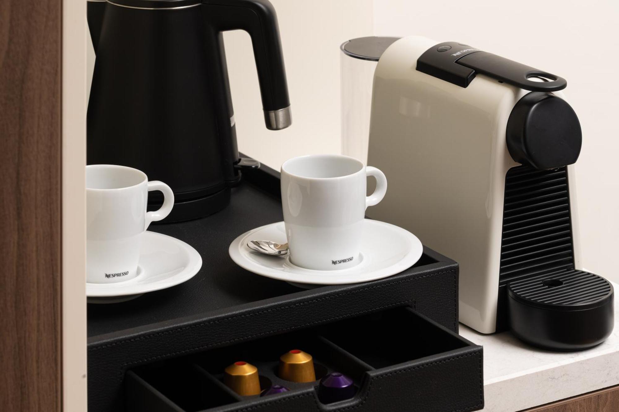 Radisson Blu Hotel, Cluj ภายนอก รูปภาพ A Nespresso coffee machine